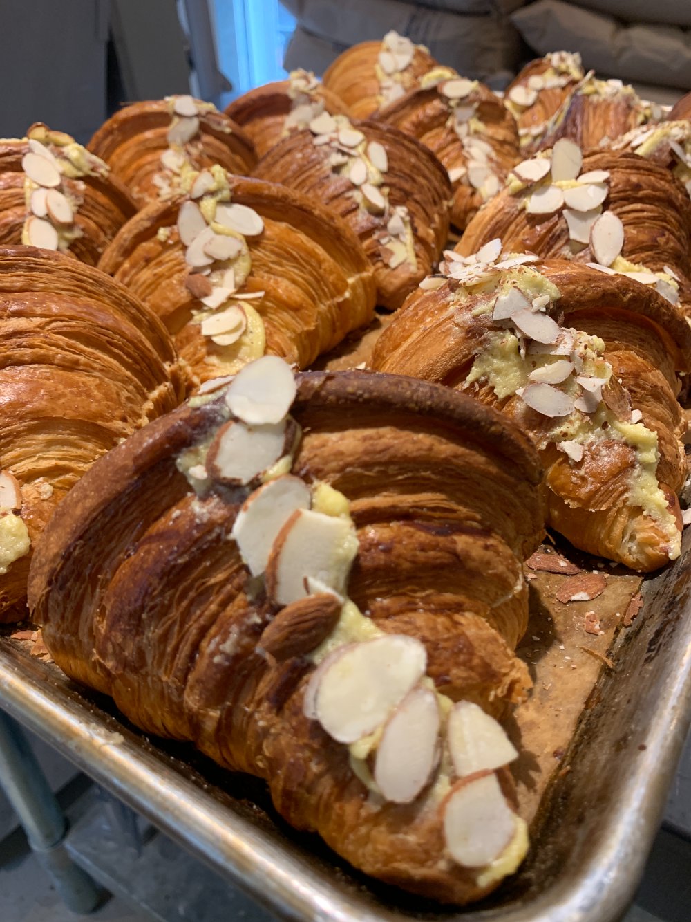Almond croissants topped with sliced almonds